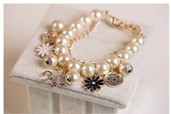 Pearl & Flower Style Bracelet - Infinity Beautiful Boutique