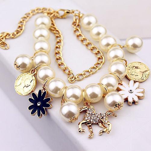 Pearl & Flower Style Bracelet - Infinity Beautiful Boutique