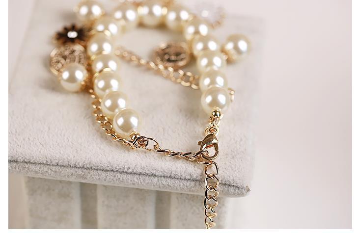 Pearl & Flower Style Bracelet - Infinity Beautiful Boutique